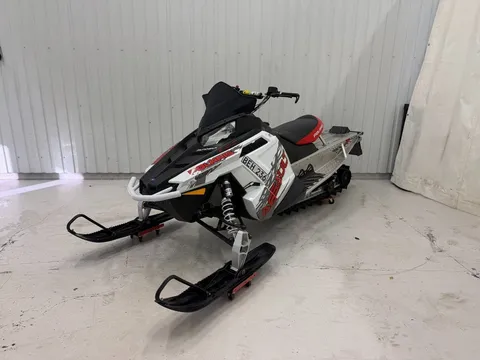 Polaris Switchback 600 Assault 144" Låga mil 2014