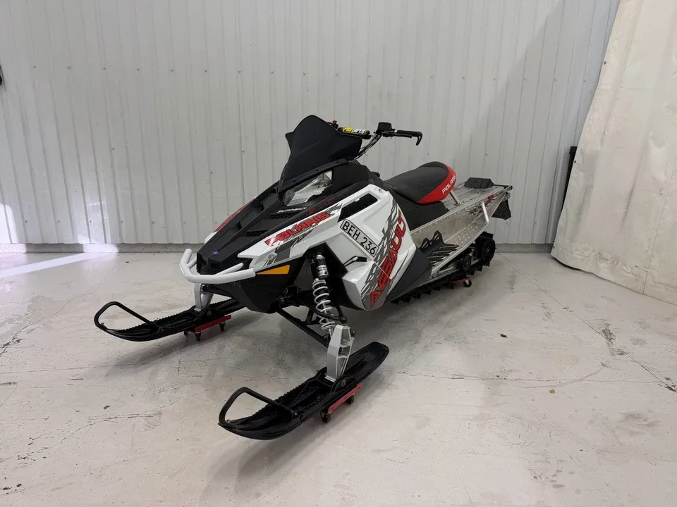 Polaris Switchback 600 Assault 144" Låga mil 2014
